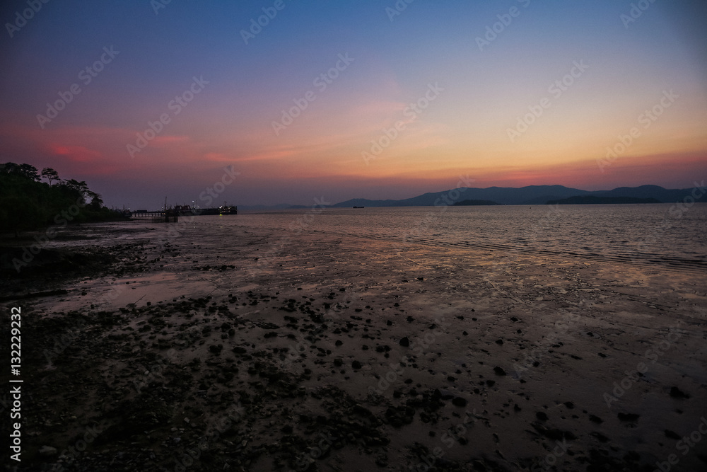 Ocean sunset with twilight sky in Thailand