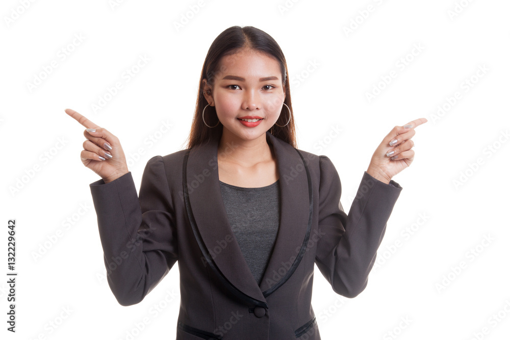 Young Asian business woman point to left and right. Young Asian business woman point to left and right.