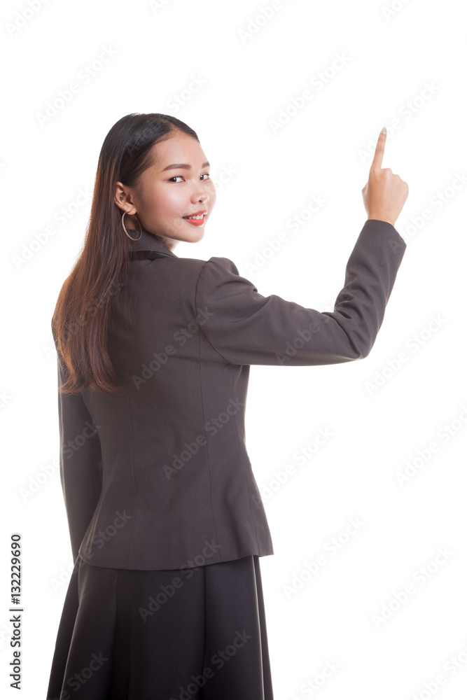 Back of Asian business woman touching the screen with her finger Back of Asian business woman touching the screen with her finger