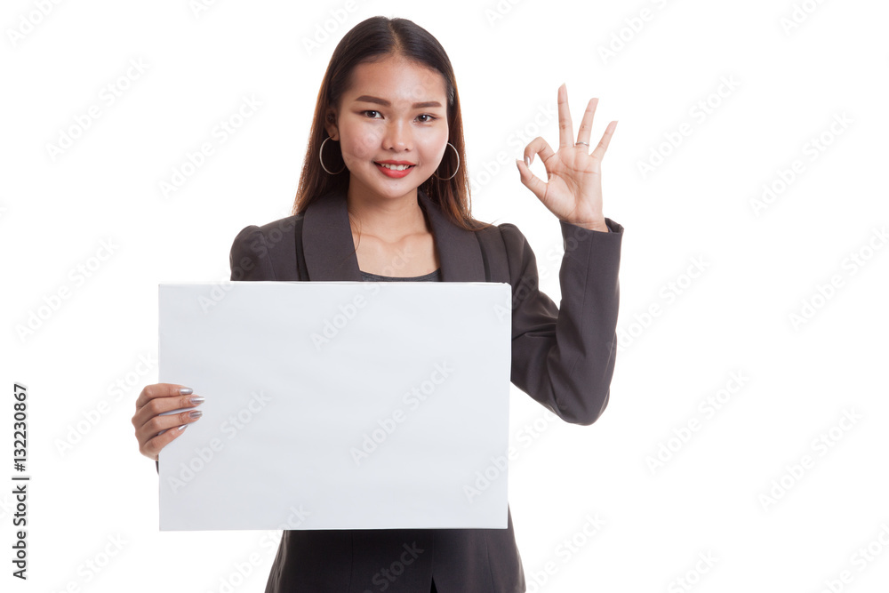 Young Asian business woman show OK with white blank sign. Young Asian business woman show OK with white blank sign.