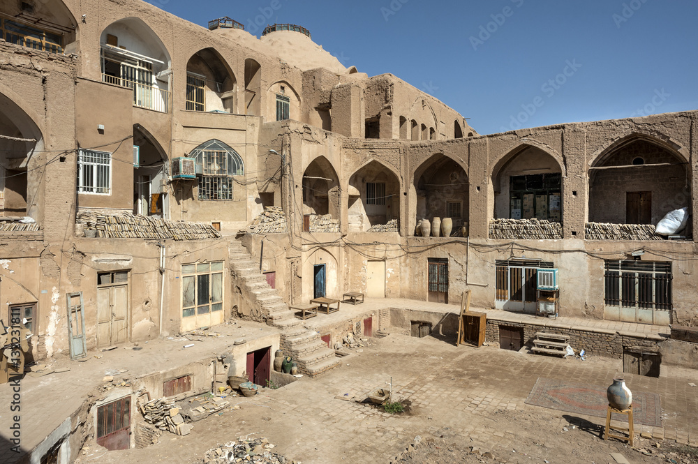 Iran, Kashan: Backyard with several levels, stairway, and sunken courtyard behind the old bazaar in the city center.