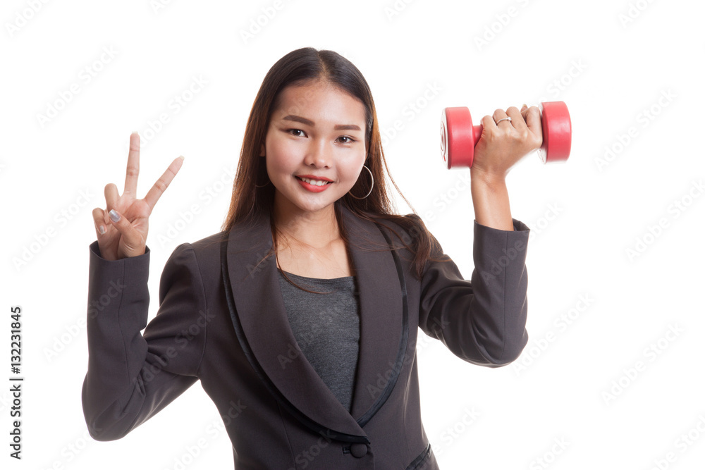 Healthy Asian business woman show victory sign with dumbbells. Healthy Asian business woman show victory sign with dumbbells.