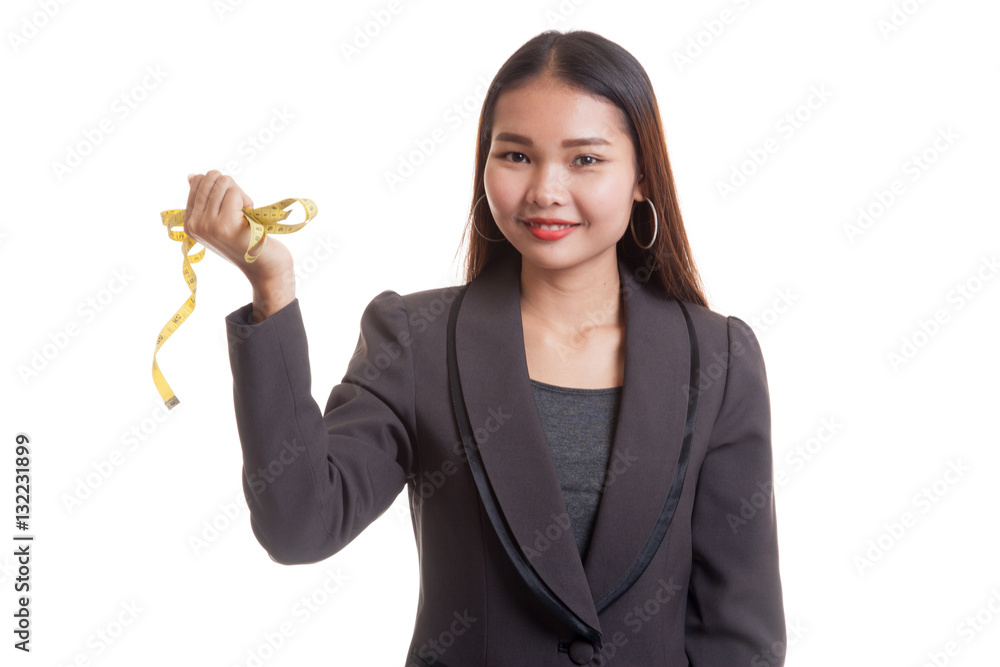 Young Asian business woman with measuring tape. Young Asian business woman with measuring tape.