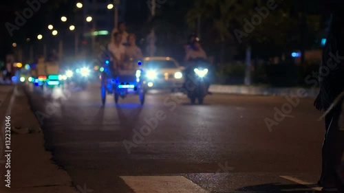 Wallpaper Mural Night city. Defocused lights of cars, unrecognizable people. Torontodigital.ca