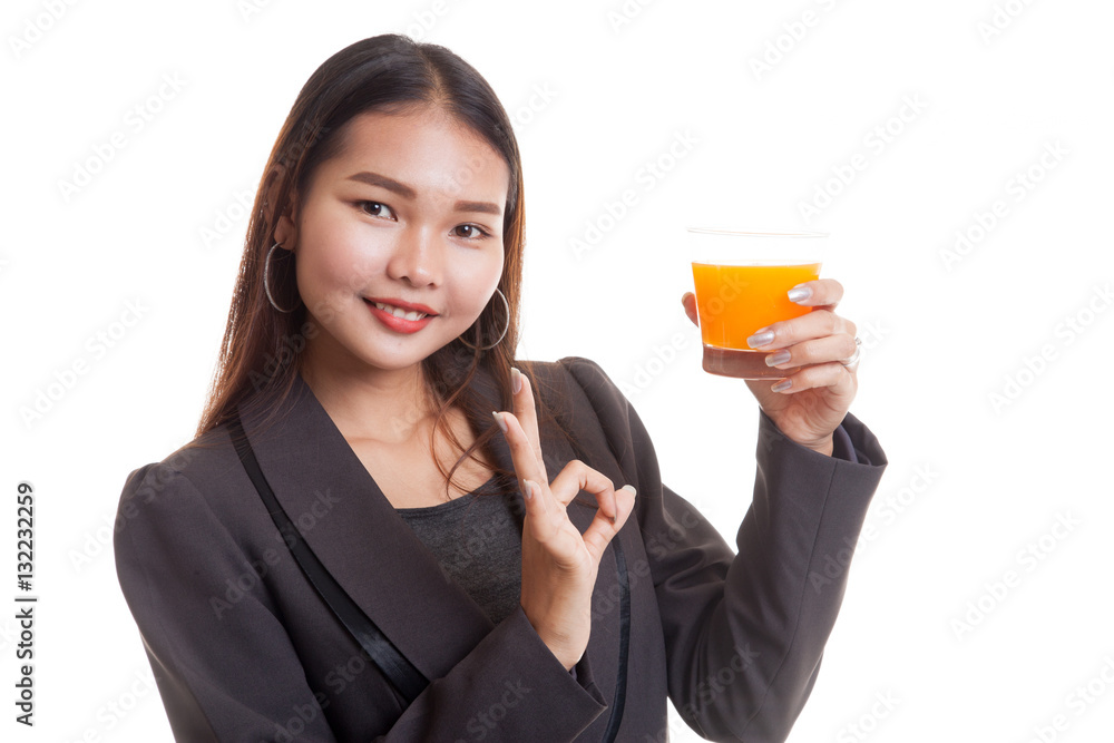 Young Asian woman show OK drink orange juice. Young Asian woman show OK drink orange juice.