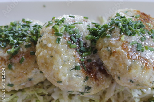 Tyrolean traditional dish, knodel or canederli with parsley   photo