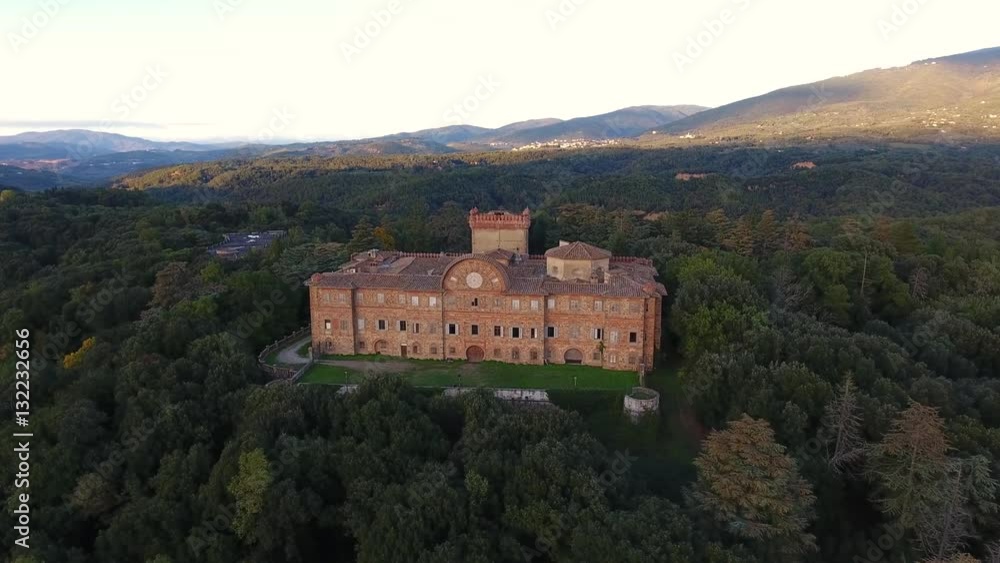 Aerial shot, gorgeous italian Sammezzano abbandoned castle, with the sun behind, filmed with drone Aerial shot, gorgeous italian Sammezzano abbandoned castle, with the sun behind, filmed with drone