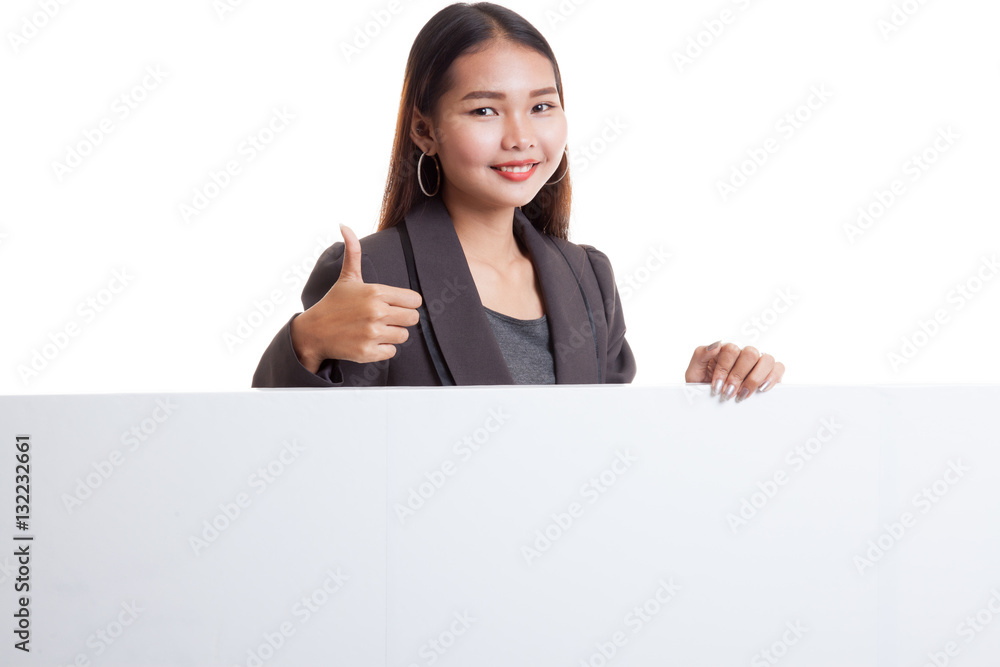 Young Asian woman show thumbs up with blank sign. Young Asian woman show thumbs up with blank sign.