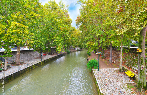 Lithaios river flowing through the city of Trikala Thessaly Greece photo