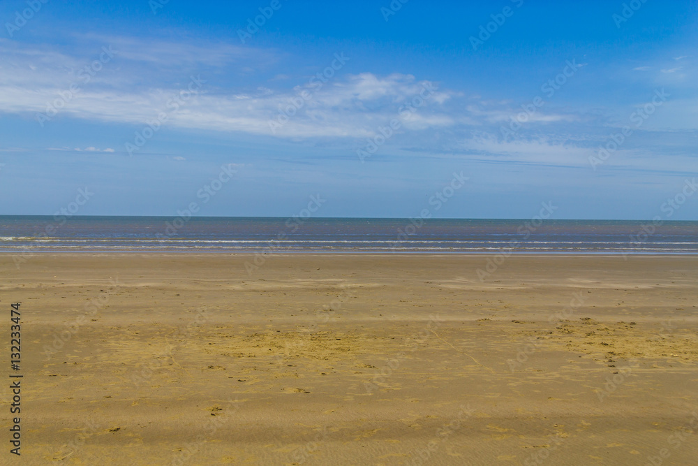 Clouds, sand and waves in Cassino beach Clouds, sand and waves in Cassino beach