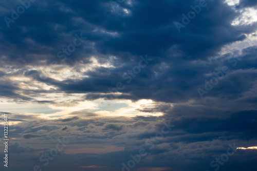 Color of dramatic sky with stormy sunset clouds. © kaiskynet