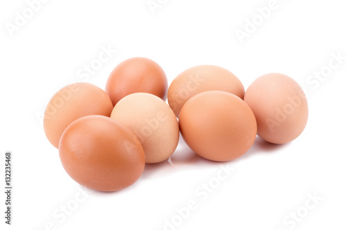 Brown eggs isolated on white background.
