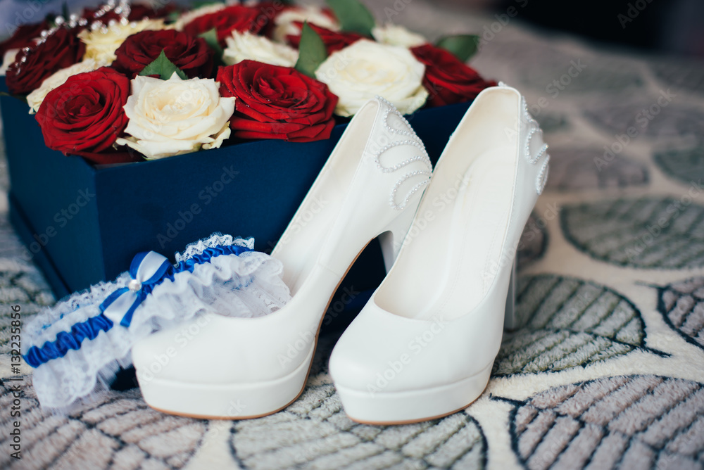 Wedding shoes and roses in a box Wedding shoes and roses in a box