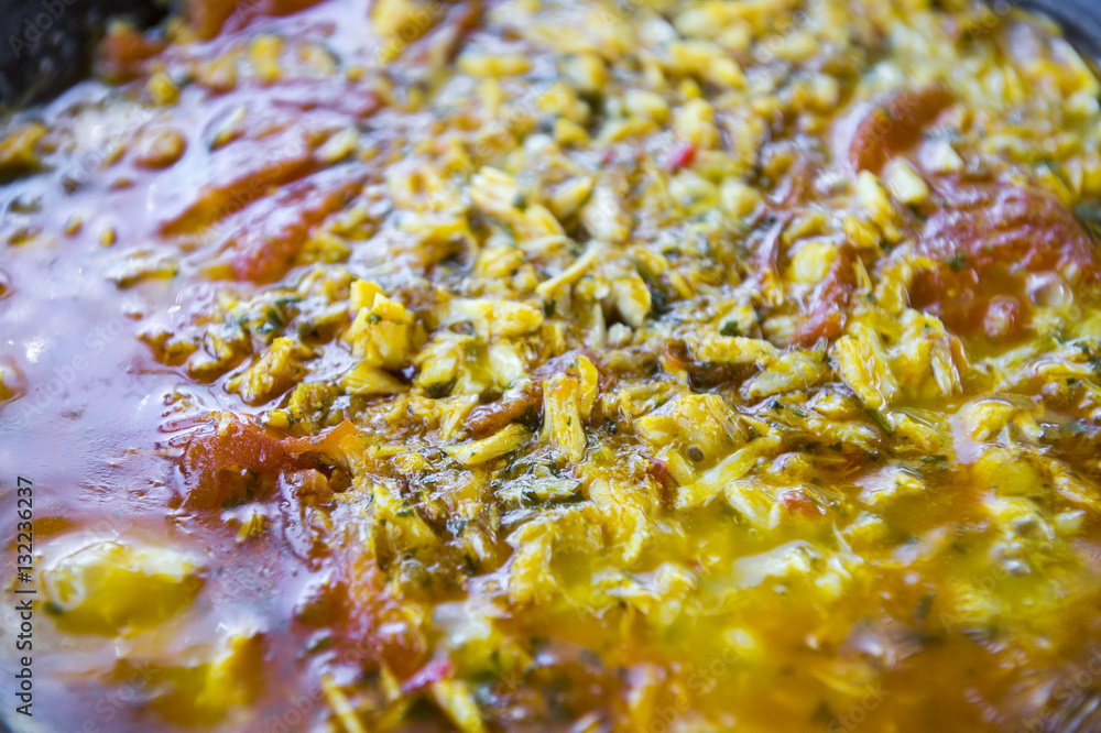 Close up of fresh pot of Brazilian moqueca stew Close up of fresh pot of Brazilian moqueca stew