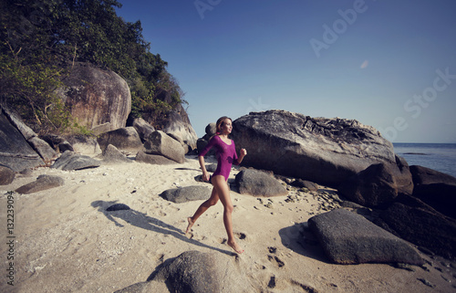 model running in tropic sea side