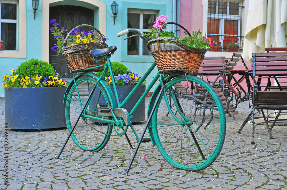 Bike with flowers in the street