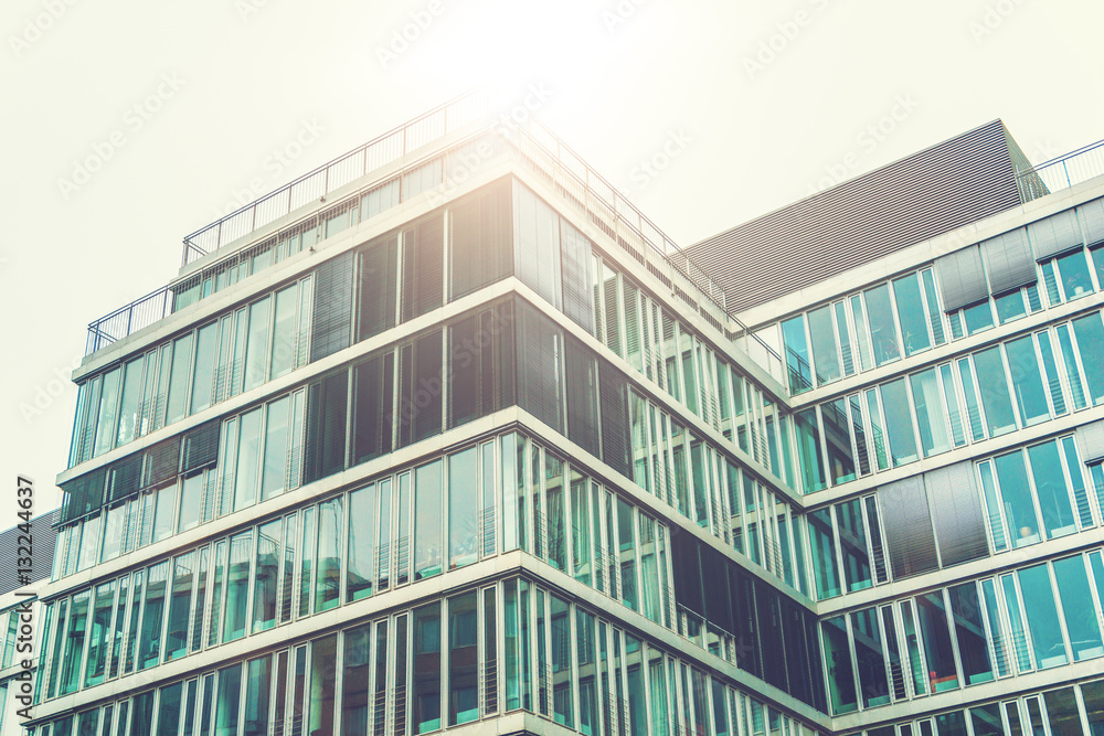 Fototapeta premium blue glass facade in sunlight