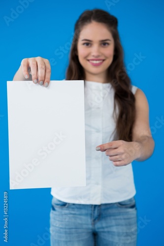 Woman holding a blank placard 