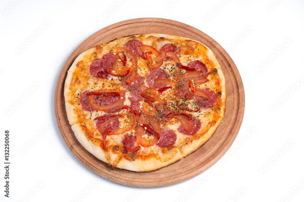 Big appetizing pizza on a wooden tablet