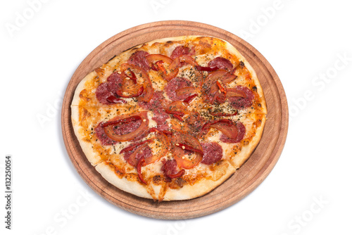 Big appetizing pizza on a wooden tablet