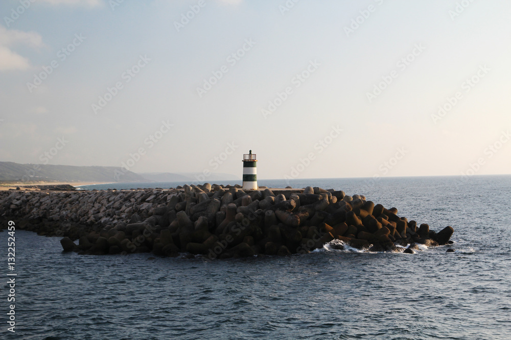A lighthouse at Atlantic Ocean seaside in Porto, Portugal 