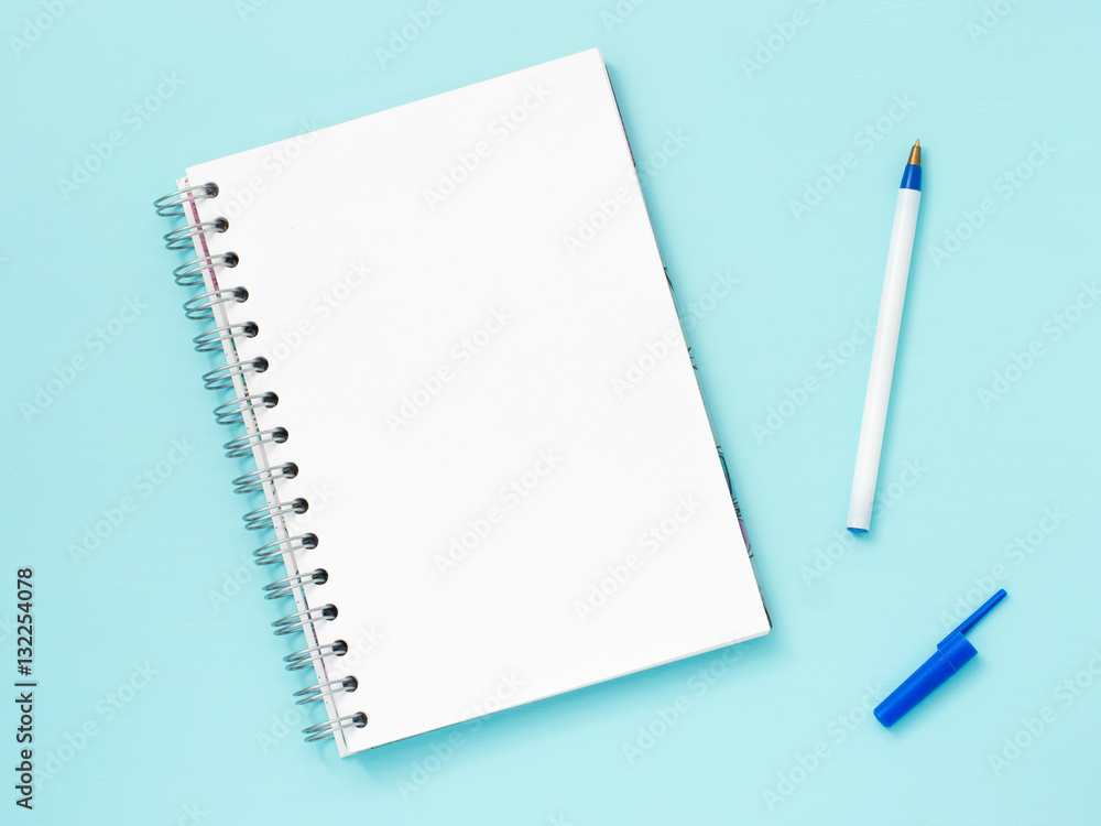 blank note paper on blue background blank note paper on blue background