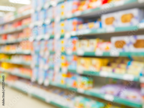 Wallpaper Mural Blurred colorful supermarket products on shelves Torontodigital.ca