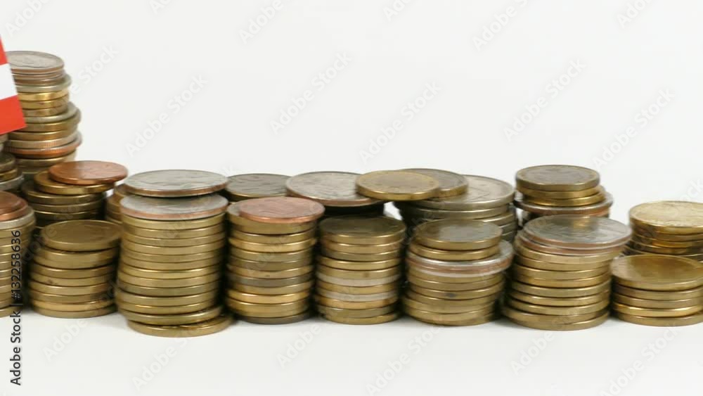 Austria flag waving with stack of money coins Austria flag waving with stack of money coins