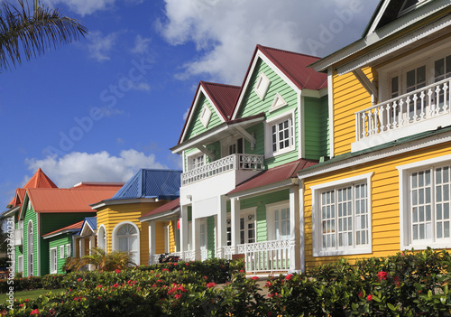 The wooden houses painted in Caribbean bright colors in Samana, Dominican Republic photo