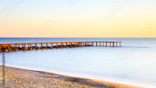 Mediterranean Dusk.  A long exposure of dusk over the Mediterranean Sea viewed from the southern Turkish coastline near Turkler. photo