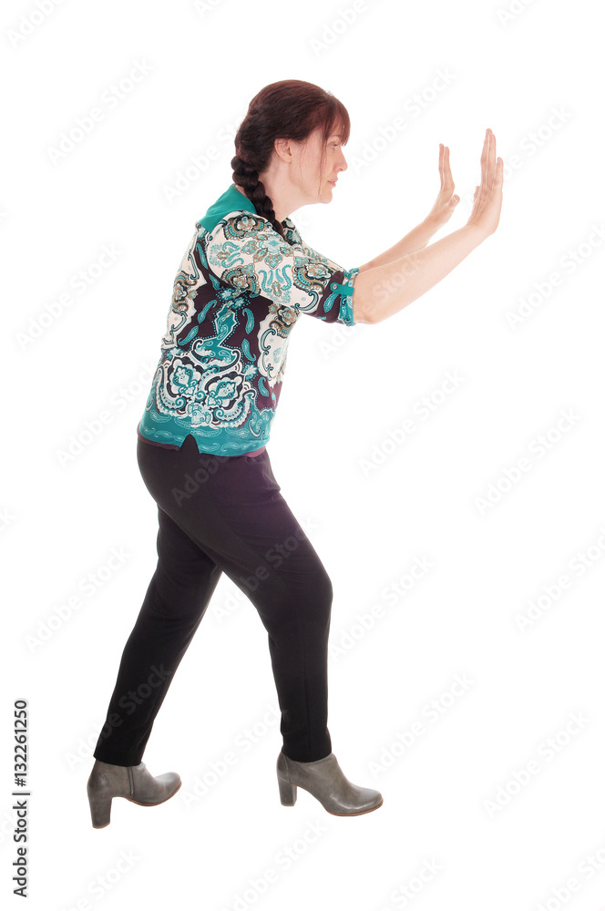 Woman pushing something away. Woman pushing something away.