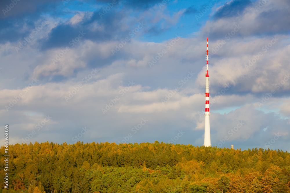 Obraz premium TV tower in the autumn forest