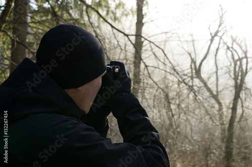 Photographer shooting the nature in winter. Slovakia