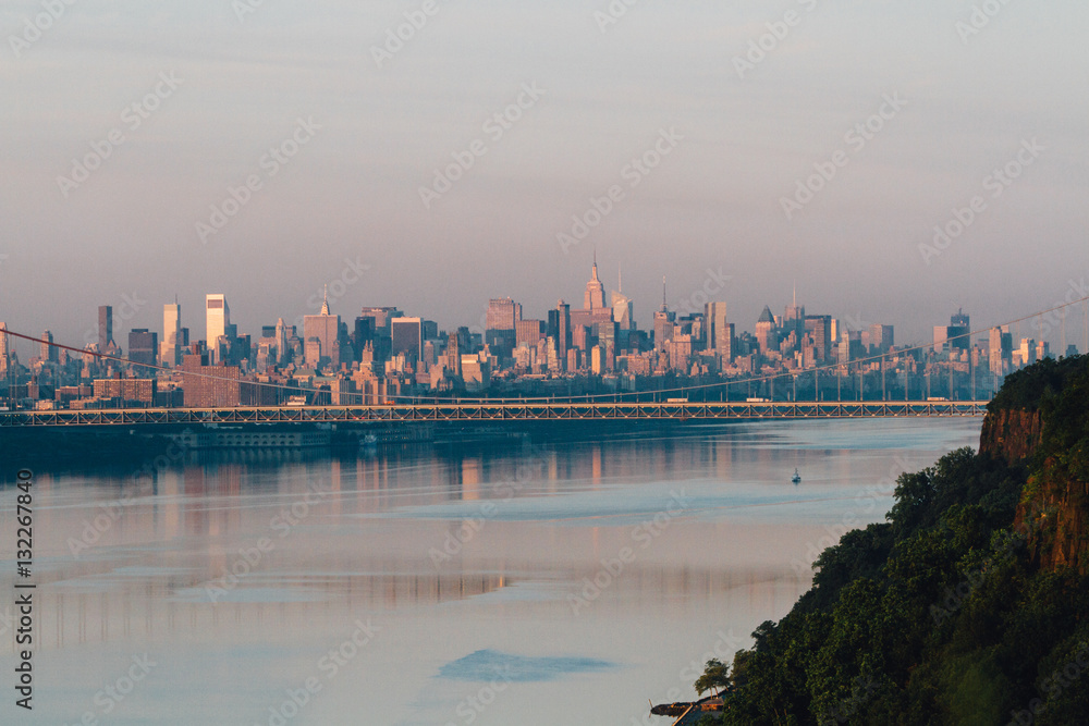 NYC skyline at sunrise with George Washington Bridge