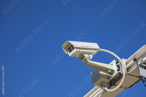 surveillance camera in the blue sky