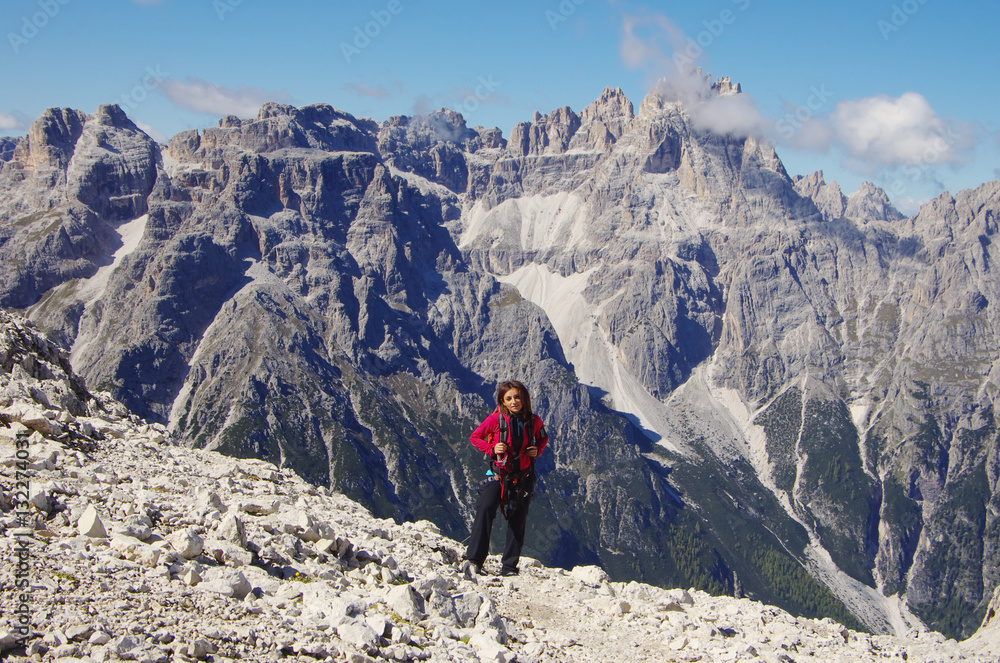 Young attractive female hiker on top of Croda Rossa