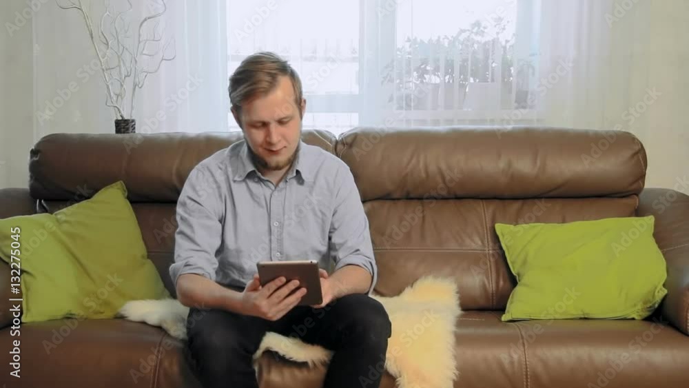 Young businessman using digital tablet Young businessman using digital tablet