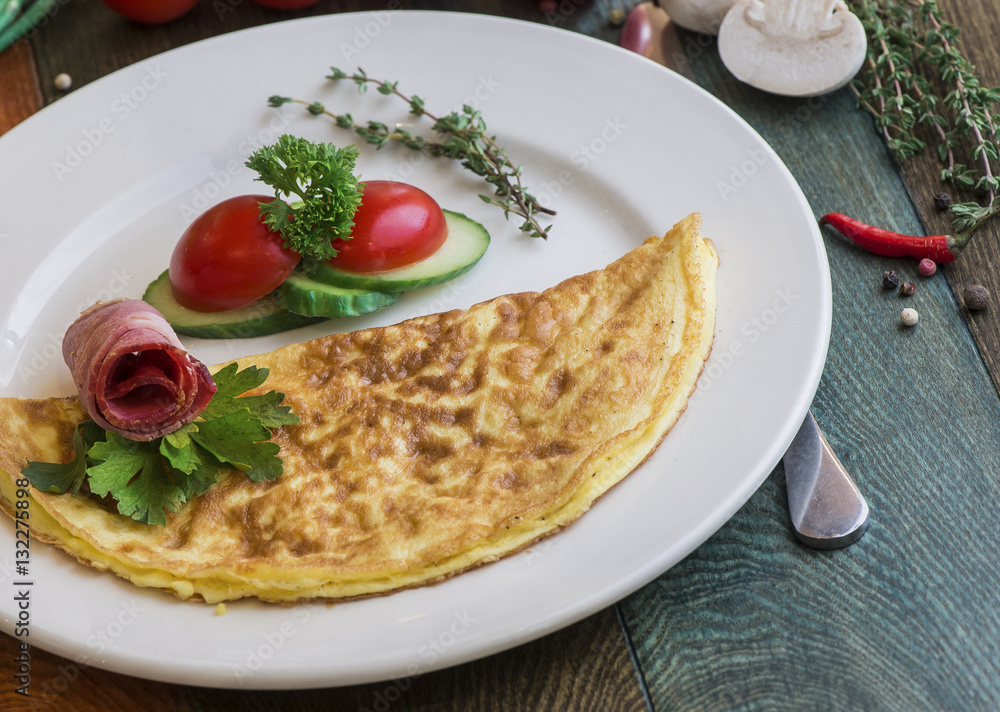 Appetizing fried eggs for breakfast. Fried eggs with herbs