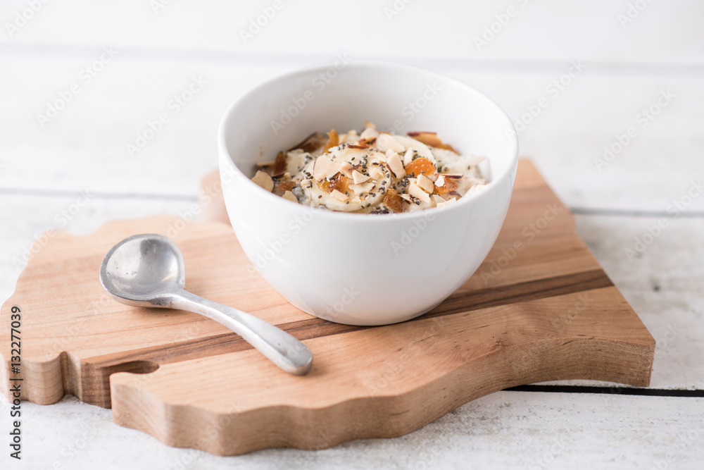 Muesli granola breakfast in a white bowl Muesli granola breakfast in a white bowl