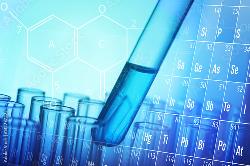 Obraz na plátne Health care concept. Test tube with fluid, blue tone