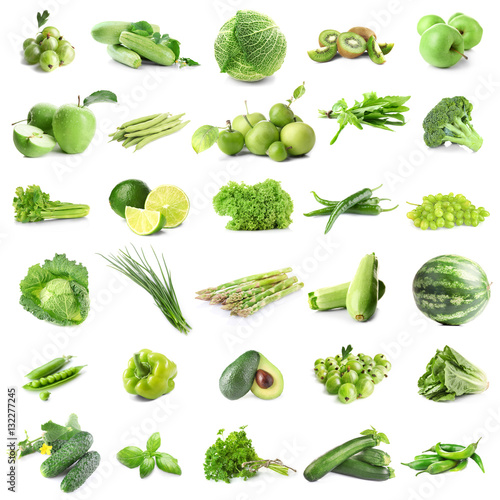 Assortment of fresh vegetables and fruits on white background
