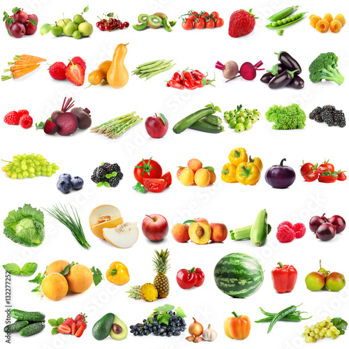 Assortment of fresh vegetables and fruits on white background