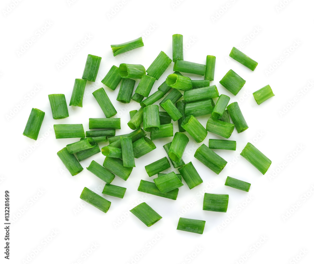 chopped green onions on white