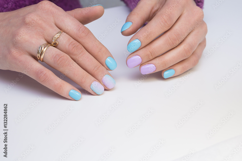 Amazing manicure and natural nails with gel polish. Attractive modern nail art design. Amazing manicure and natural nails with gel polish. Attractive modern nail art design.