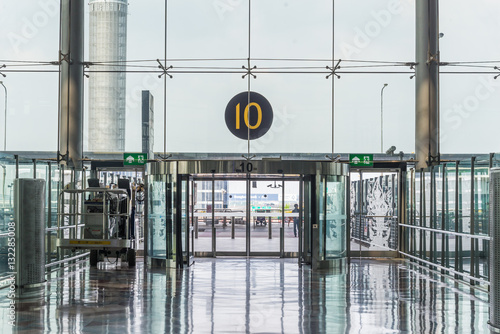 Modern airport interior glass wall aisle window and door