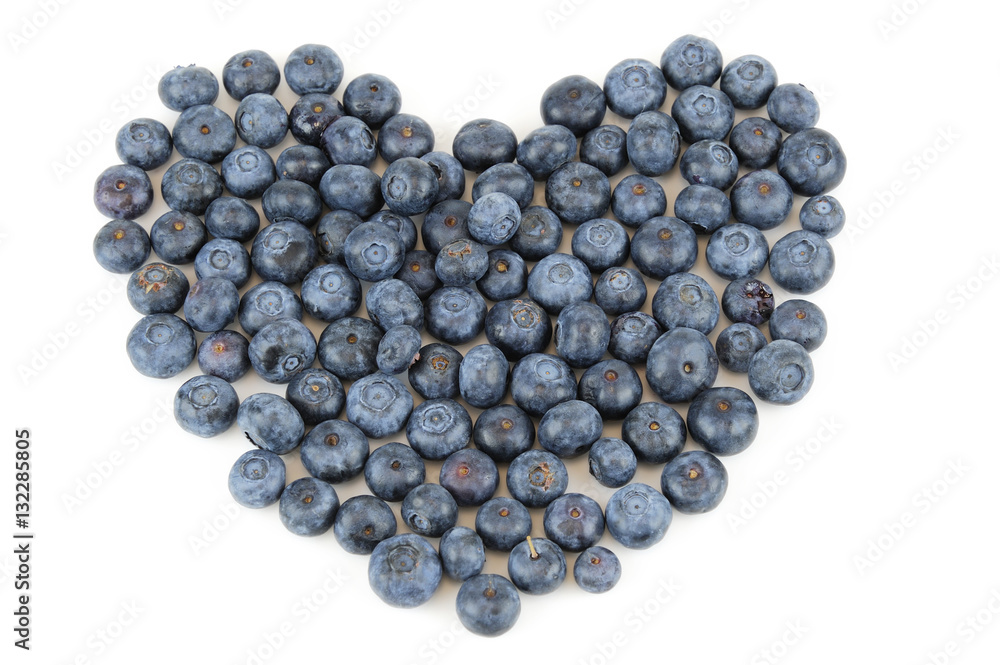 blueberry arranged in heart shape isolated on white background blueberry arranged in heart shape isolated on white background