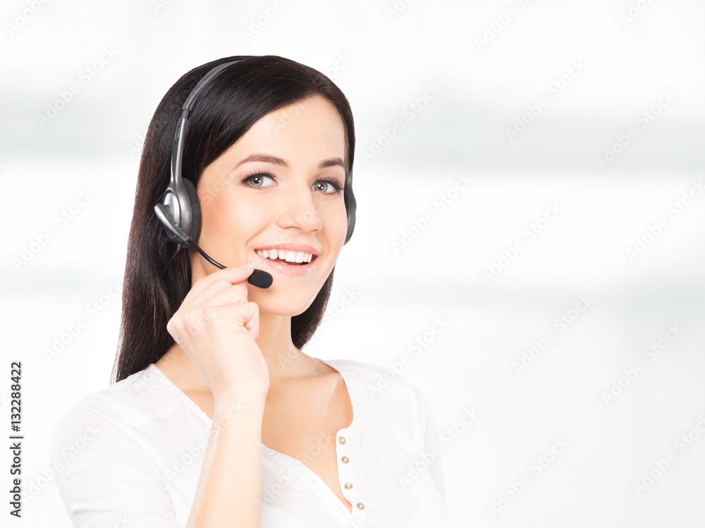 Operator working in a call center office Operator working in a call center office