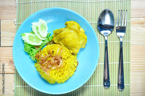 Chicken biryani rice, traditional food spicery fried crispy onio photo