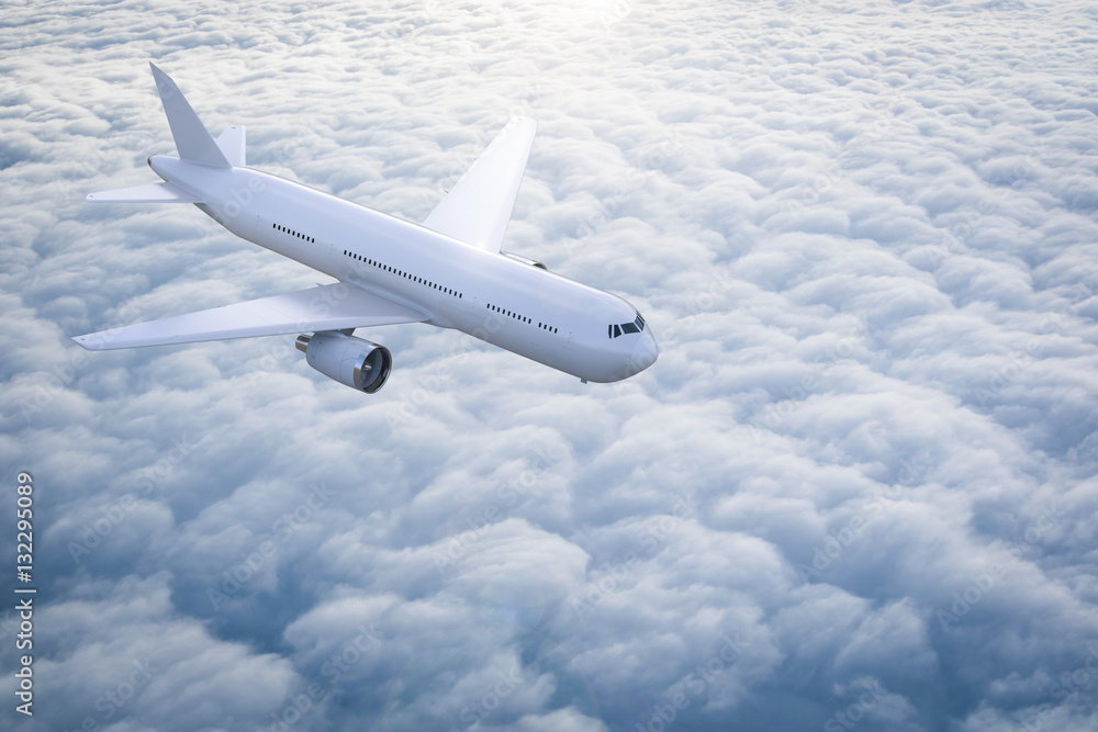 Obraz premium airplane flying above cloudy sky