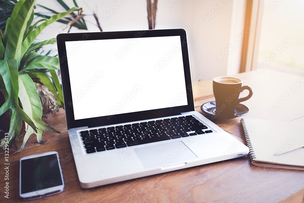 Fototapeta premium laptop on table. In the coffee shop.